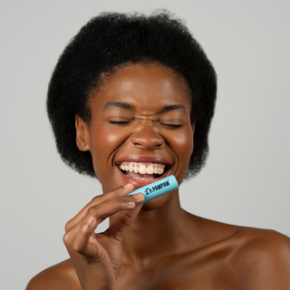 Balsam stick pentru buze, cu aroma de cocos si pawpaw, ulei de ricin si aloe vera, Dr.PAWPAW, 4 g