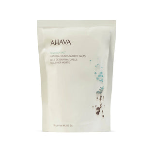A white stand-up pouch of AHAVA Dead Sea Salt Natural Dead Sea Bath Salts, 731 g (25.5 oz), on a clean white background.