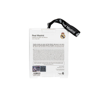 Real Madrid Hand Soap Bar in its white cardboard packaging, featuring the club's crest and a black wrist strap with white lettering, shown against a plain white background.