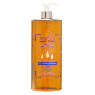 A bottle of Free Sens Shower Oil with a white pump dispenser and silver collar, containing amber-colored oil, on a white background.