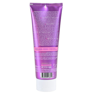 A 120 ml squeeze tube of Garnier Frère hair product, shown from the back. The tube is metallic purple with white text and a white cap, set against a plain white background.