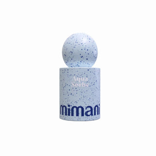 A light blue speckled cylindrical container with a matching round lid, featuring the brand name 'mimani' printed in dark blue on the front, set against a plain white background.