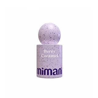 A Mimani 'Berry Caramel' perfume bottle with a spherical cap and cylindrical base, both in a light lavender-purple speckled finish with dark purple text and accents, set against a plain white background.