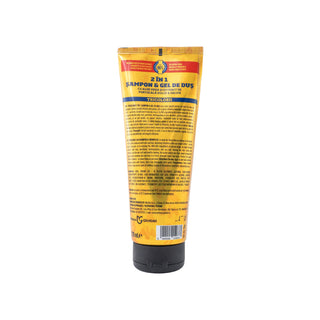 A squeeze tube of hair care product shown from the back, featuring a yellow and orange label with text in English and Turkish, and a black cap, on a plain white background.