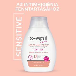 A bottle of x-epil Intimo Sensitive Intimate Cleansing Wash centered on a peach-pink background with Hungarian promotional text above and a vertical 'SENSITIVE' label on the left.