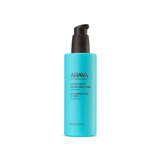 Blue bottle of AHAVA Deadsea Water Mineral Body Lotion on a white background