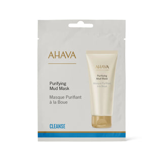 AHAVA Purifying Mud Mask single-use pouch packaging, featuring a cream-colored tube illustration on a light gray pouch with gold and blue text.
