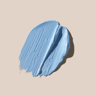 Blue paint swatch on a beige background