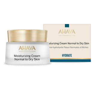 AHAVA Moisturizing Cream Normal to Dry Skin jar with a gold lid in front of its cream-colored product box on a white background.