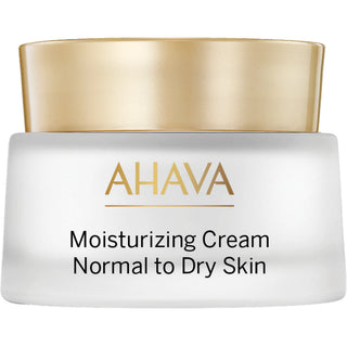 A jar of AHAVA Moisturizing Cream, Normal to Dry Skin, featuring a white container and a metallic gold lid on a clean white background.