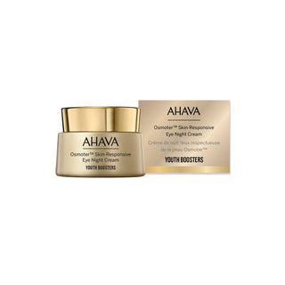 AHAVA Osmoter Skin-Responsive Eye Night Cream in a gold jar, shown next to its matching gold packaging box on a clean white background.