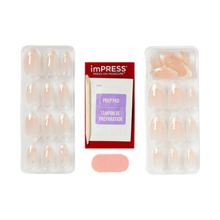 A set of press-on nails shown with their packaging on a white background. The set includes two trays of nude beige press-on nails, a red and white imPRESS prep pad packet, and a small pink nail file.
