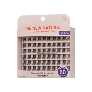 Kiss Cosmetics 'The New Natural' 60-pair false eyelash cluster in its original packaging, featuring a beige card with a clear window showing the lash clusters inside.