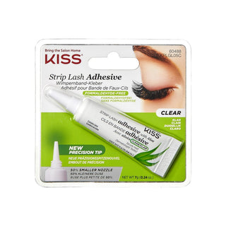Kiss Strip Lash Adhesive in the shade Clear, packaged in a blister card with a small white and green applicator tube and a precision tip shown separately.