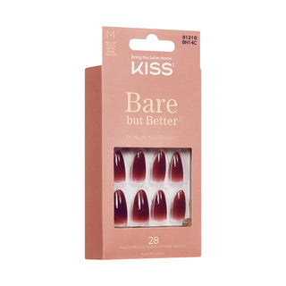 Kiss Bare but Better press-on nail shade M in a pink retail box with a clear window showing eight glossy dark burgundy nails.