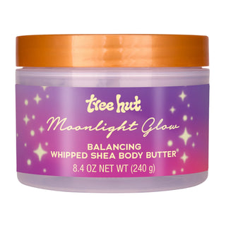 Tree Hut Moonlight Glow Balancing Whipped Shea Body Butter in a 240g jar with a purple label and orange lid, on a white background.