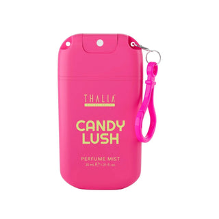 A bright pink protective case for Thalia Candy Lush perfume mist, featuring a matching wrist strap and a silver metal ring, set against a plain white background.