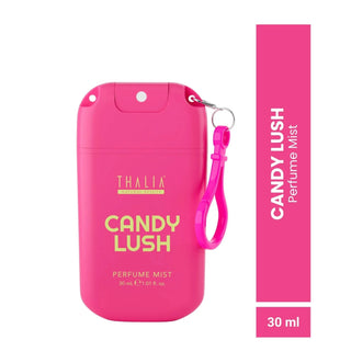 A bright pink Thalia Candy Lush perfume mist container with a matching wrist strap, shown on a white background next to a vertical pink label reading 'Candy Lush Perfume Mist' and '30 ml'.