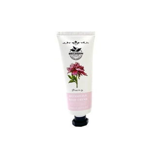 Tub de crema de maini Beacasan cu design floral, pe fundal alb