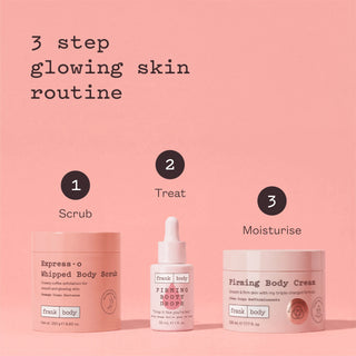 Three skincare products arranged on a pink background with step labels: a pink whipped body scrub jar labeled step 1, a white dropper bottle labeled step 2, and a pink firming body cream jar labeled step 3. Text at the top reads '3 step glowing skin routine.