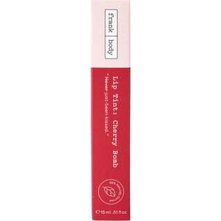 A tall, narrow pink and red box for Frank Body Lip Tint in Cherry Bomb, shown against a plain white background.