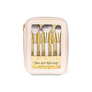 Profusion You Are Glowing! Brush Collection makeup brush set in a pale blush pink zippered case with a clear window, shown on a white background.