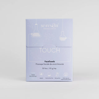 A rectangular product box for serasfin Touch FaceTowels, shown against a light gray background. The box is a very pale lavender-blue with white line drawings of laboratory glassware and text reading 'serasfin', 'TOUCH', and 'FaceTowels'.