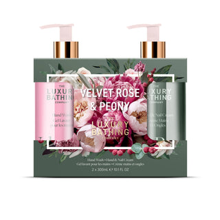 The Luxury Bathing Company Velvet Rose & Peony gift set featuring a dark green floral box with two pump bottles and two tubes, including hand wash, gel wash, nail cream, and hand cream.